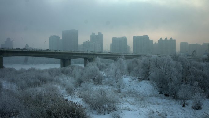 航拍冬季哈尔滨松花江公路大桥