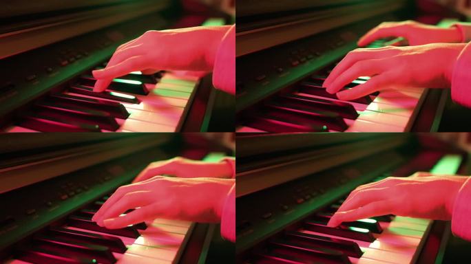 女孩弹钢琴，特写和彩色灯光