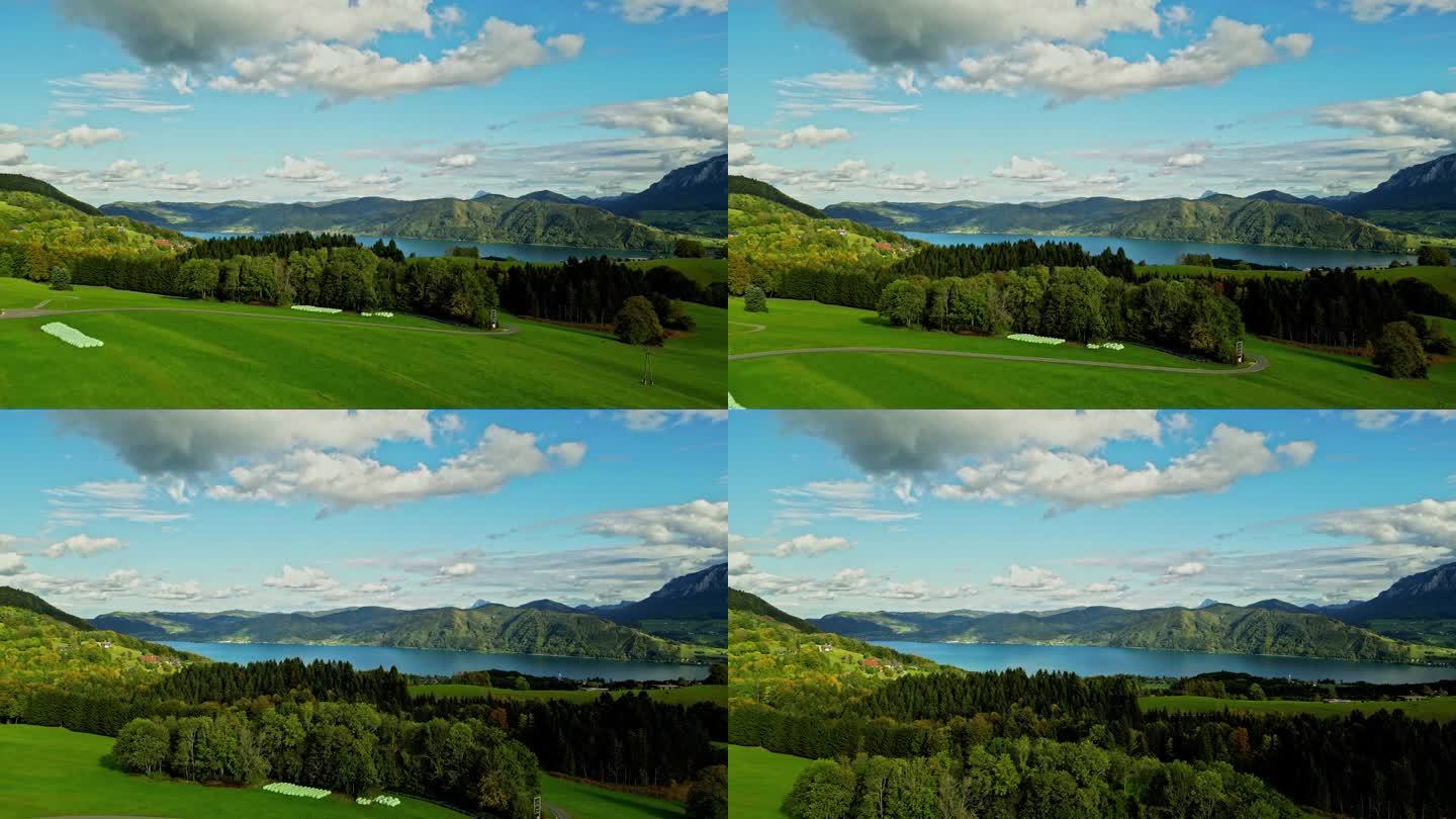 原始的山湖山谷，绿色的田野，蓝天和森林。