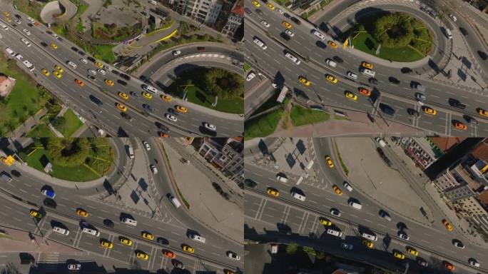 城市多车道交通的高角度视角。源源不断的彩色车辆在两个方向缓缓移动。土耳其伊斯坦布尔