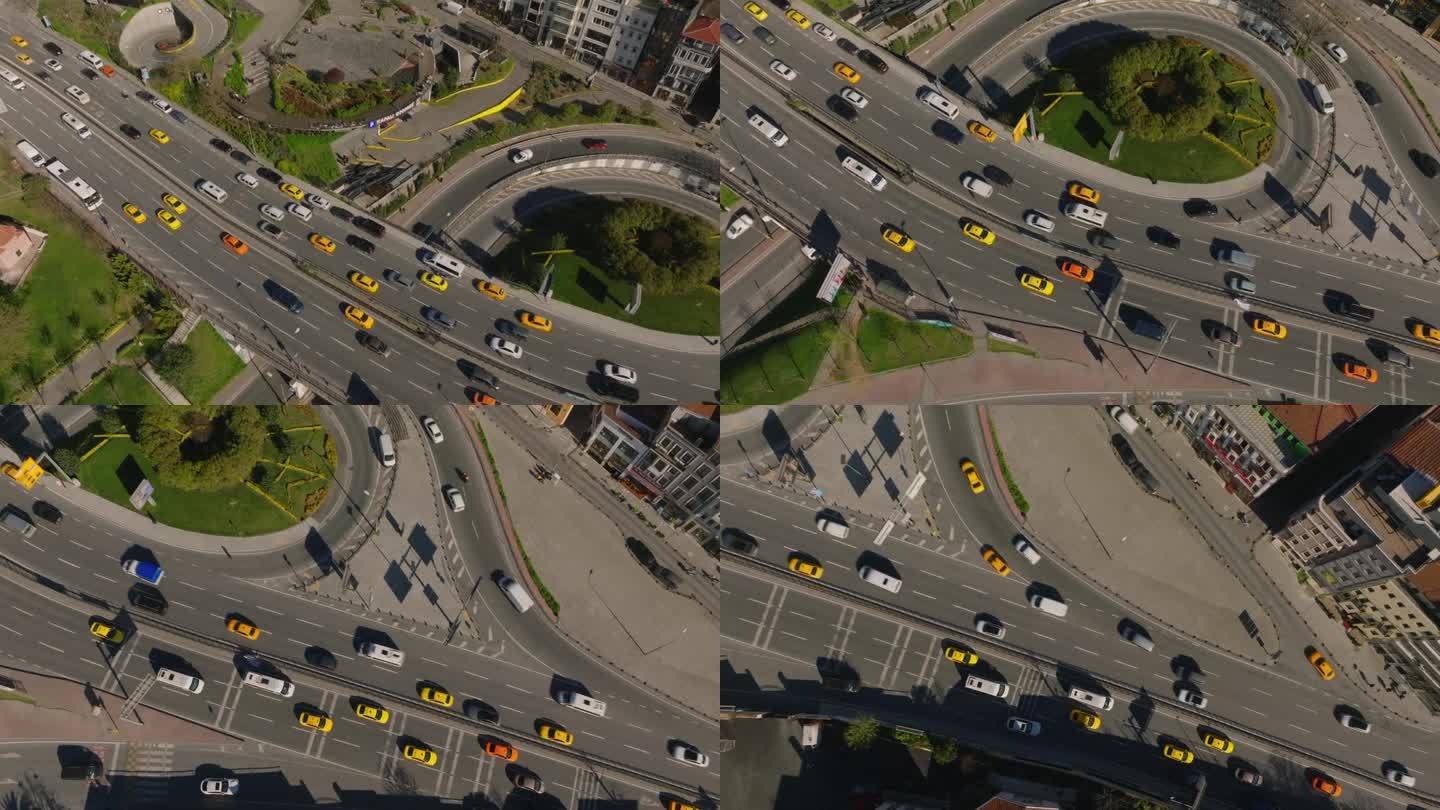 城市多车道交通的高角度视角。源源不断的彩色车辆在两个方向缓缓移动。土耳其伊斯坦布尔