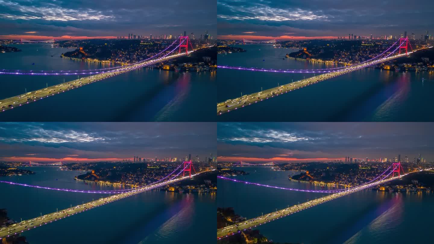 空中超速魔法:标志性的法提赫苏丹穆罕默德桥和伊斯坦布尔金融区在暮色中焕发出充满活力的色彩#Istan
