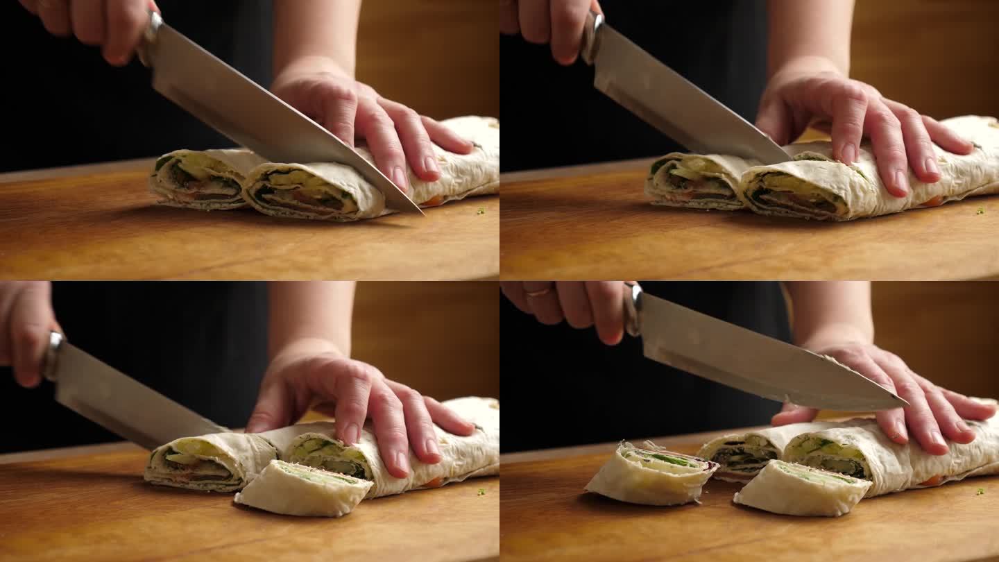 皮塔饼裹在卷里，切成小块。准备一卷奶酪，鱼和蔬菜。缓慢的运动。