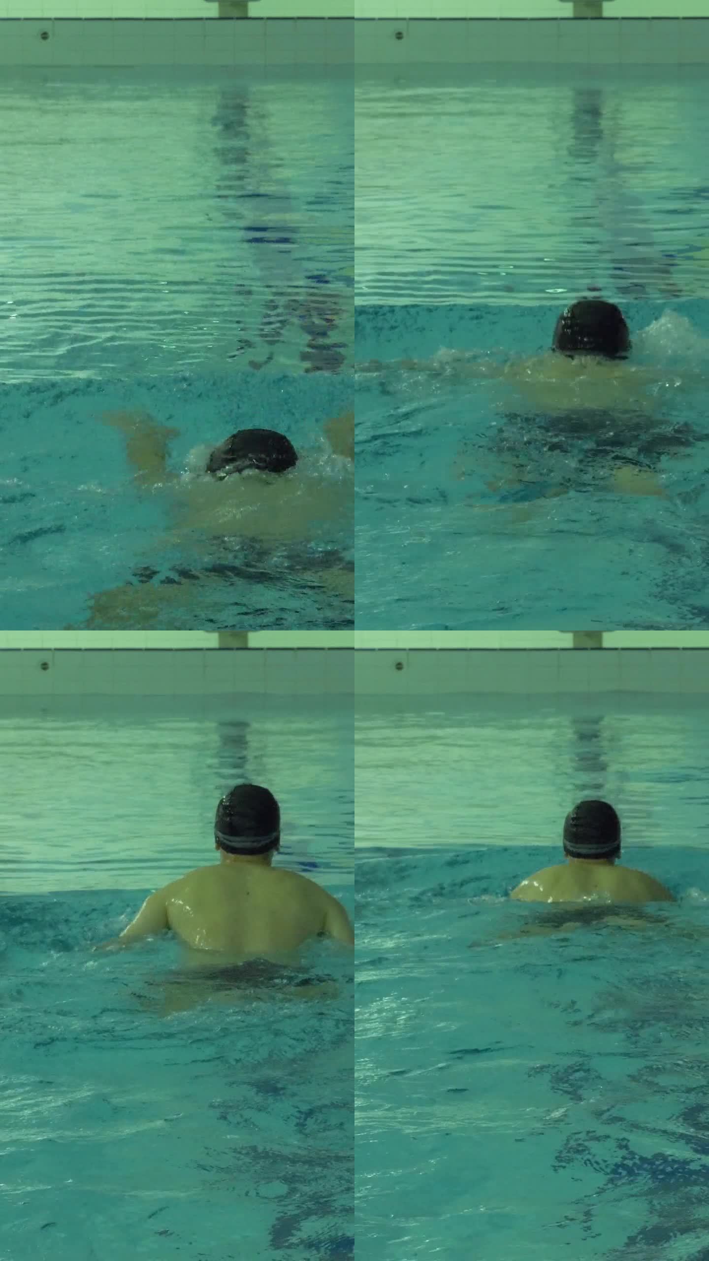 一个戴着帽子和护目镜的白人运动员正在泳池里游蛙泳。垂直视频