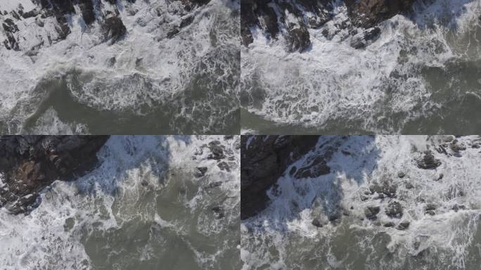 航拍俯瞰威海国际海水浴场火炬八街排石海浪