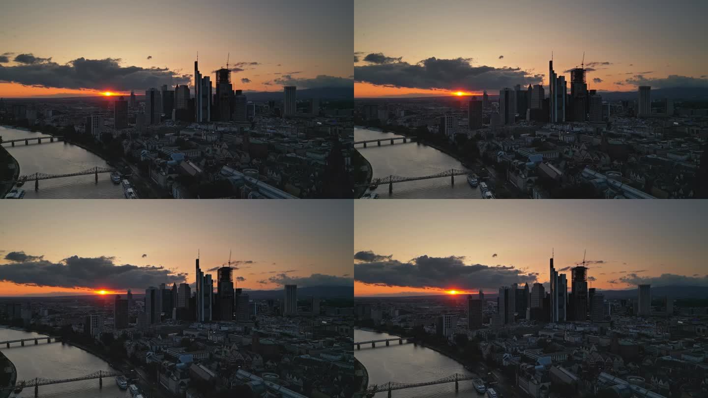 德国，欧洲，日落时分，法兰克福美因天际线的4K鸟瞰图，尽管美因河和现代金融大楼和摩天大楼