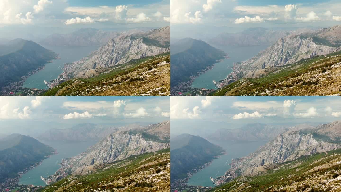 无人机俯瞰山脉和博卡科托斯卡湾亚得里亚海，黑山。科托尔及其周边地区风景如画。