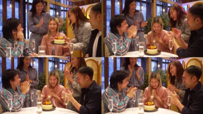 过生日的人惊喜地收到了来自她年轻的亚裔中国朋友的蛋糕