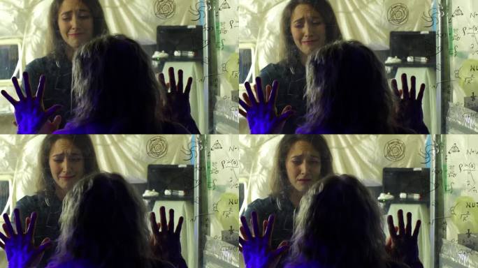 在科幻电影的场景中，小女孩在玻璃后面哭泣，同时看着一个被感染的女人