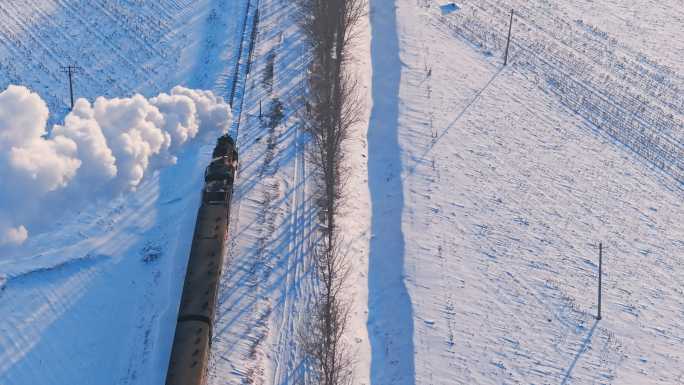 航拍中国东北冬季雪景中的蒸汽机车老火车