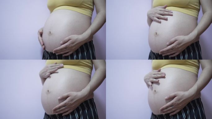 孕妇抚摸肚子怀孕