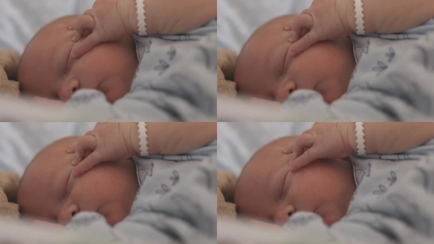 可爱的新生男婴在医院产房睡觉的特写镜头。5天大的婴儿