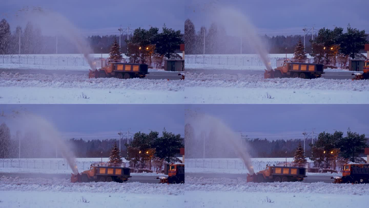 巨大的吹雪机清理跑道。大型橙色机器清除积雪。除冰设备