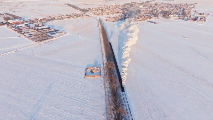 航拍中国东北冬季雪景中的蒸汽机车老火车