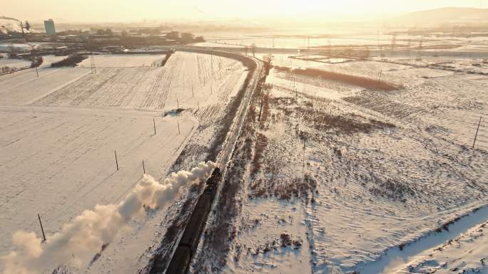 航拍中国东北冬季雪景中的蒸汽机车老火车