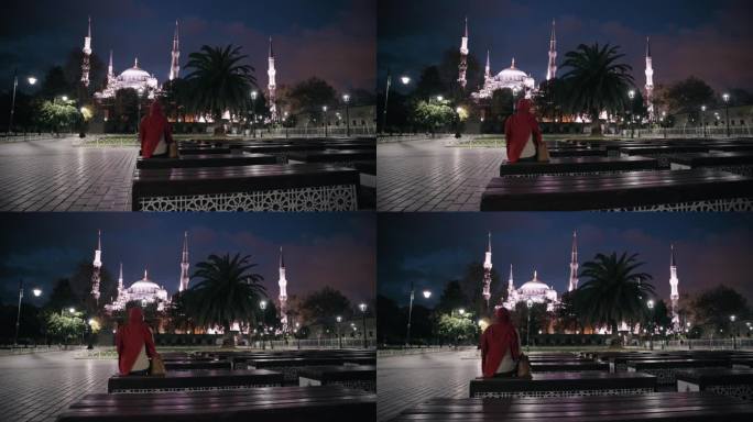 戴着头巾的穆斯林妇女在广场上凝视着圣索菲亚大教堂的雄伟之美