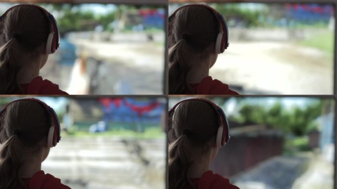 戴耳机的女孩在主机上玩电脑多人视频游戏。儿童玩家在电视屏幕上玩电子游戏。戴着耳机和操纵杆的人在大电视
