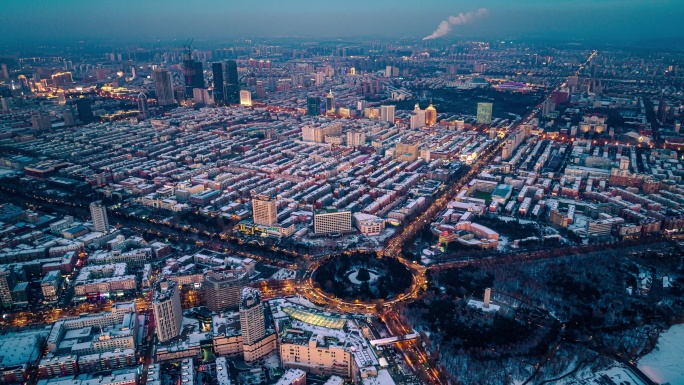 吉林长春冬季雪景航拍城市新民广场夜景