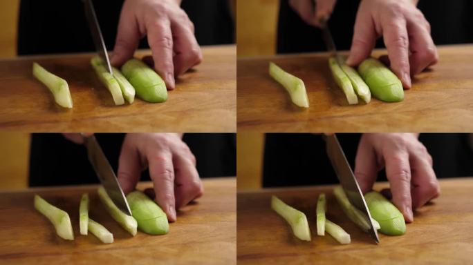 用刀把新鲜黄瓜切成小块。制作黄瓜菜