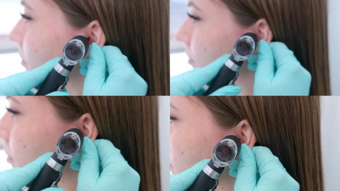 外科医生用光学内窥镜检查外耳、耳道，诊断耳部疾病。