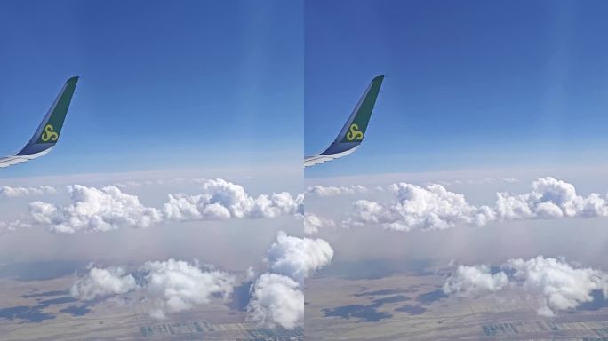 【竖屏】透过飞机窗户看下方的云和田野