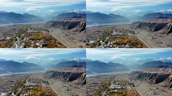 航拍新疆帕米尔高原雪山全景与奥依塔克镇