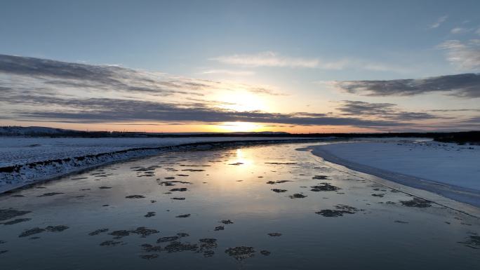 河水冰凌夕阳美景