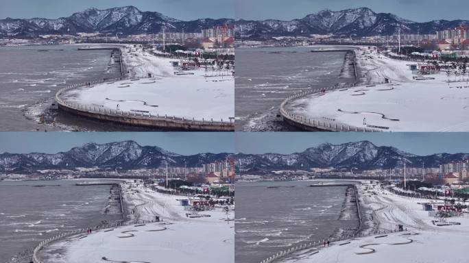 4K航拍烟台海边雪景