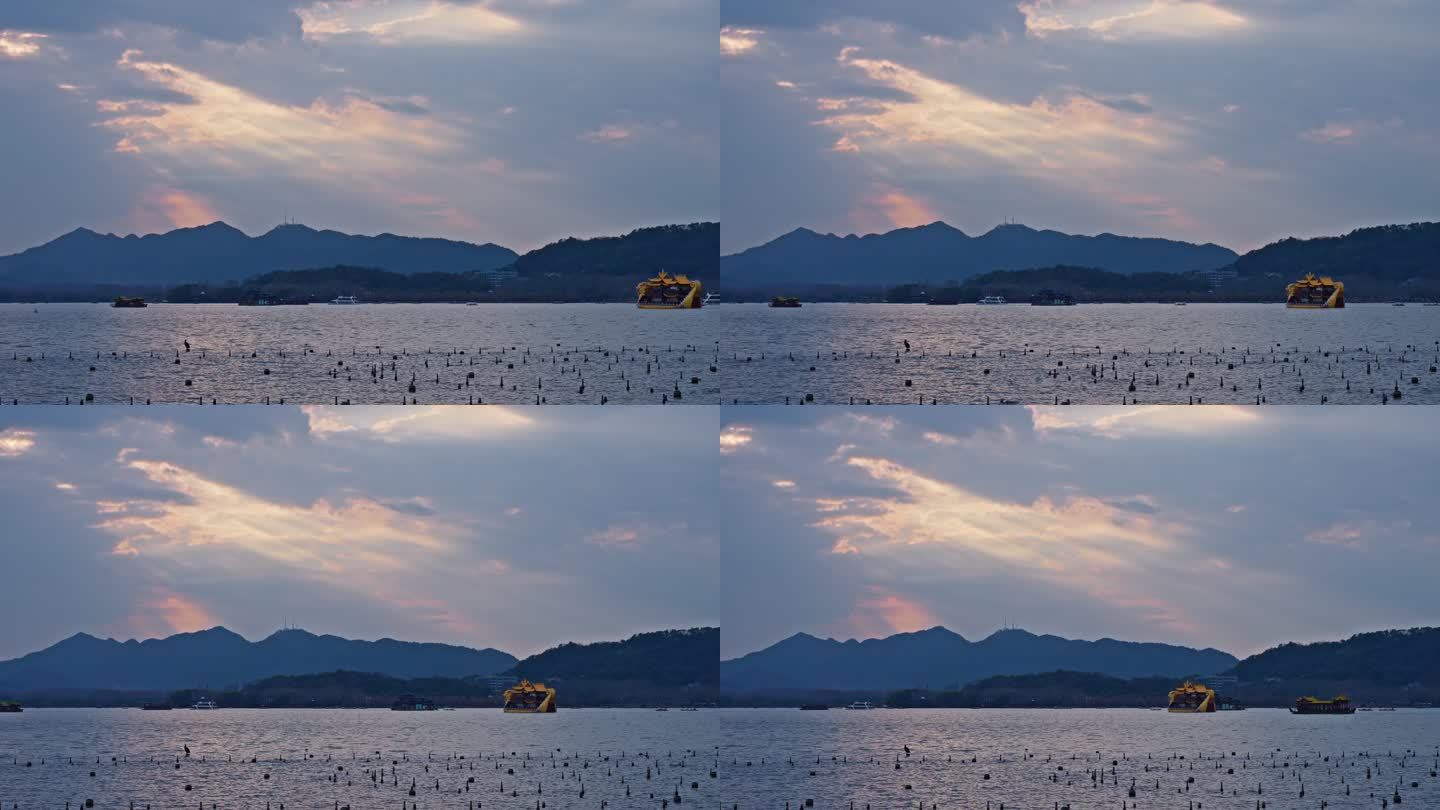 正月里黄昏西湖湖面上的游船