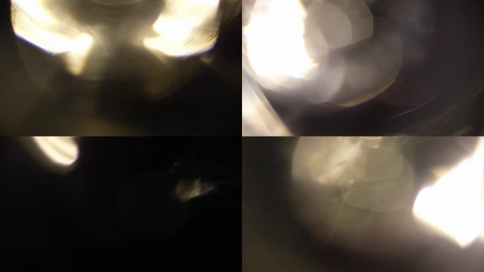 镜头与失焦的白光光束为视频元素之间的平滑过渡。明亮的亮点和抽象的运动元素为装置增添了活力和能量。