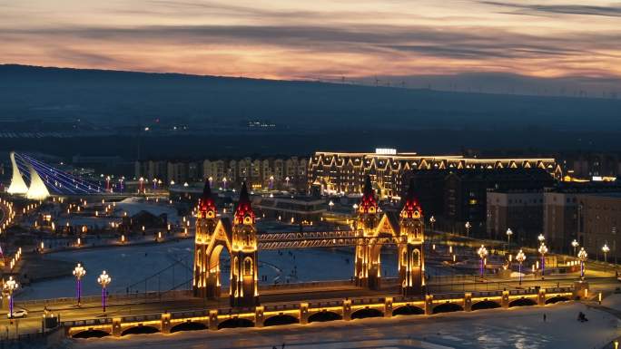 新疆布尔津县喀纳斯桥日落夜景航拍城市风景