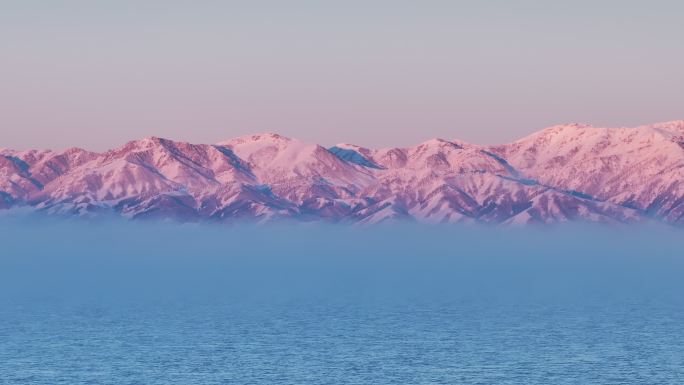新疆博州赛里木湖冬季日落雪山航拍