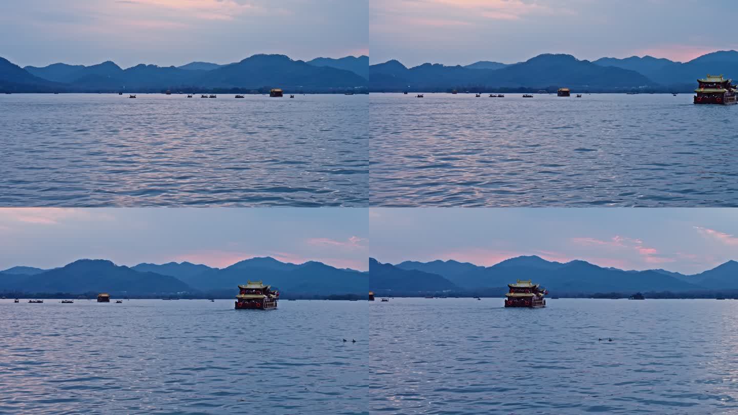 正月里黄昏西湖湖面上的游船