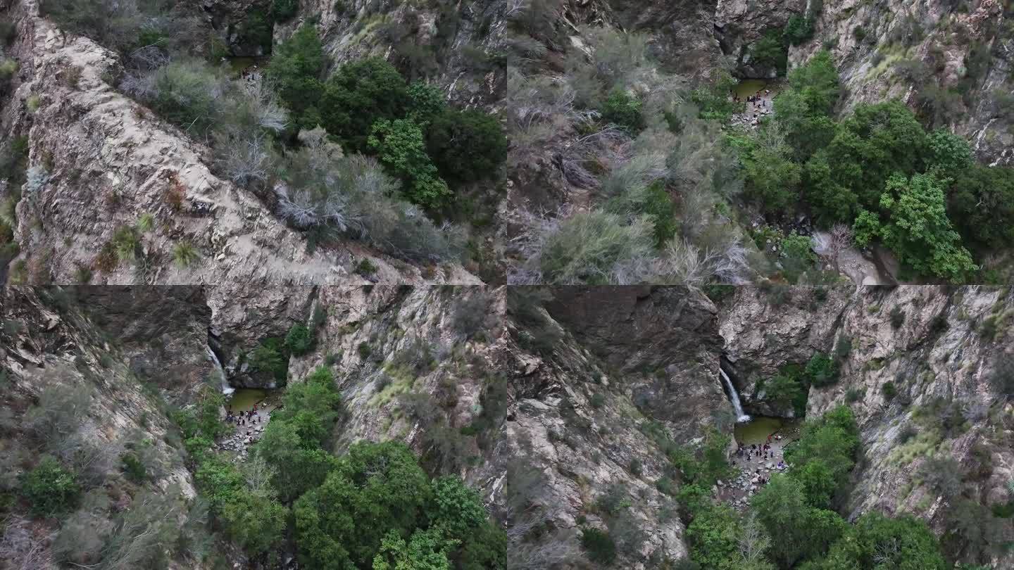 伊顿峡谷瀑布的揭示，在洛杉矶国家森林帕萨迪纳加州一大群人航拍揭示60fps
