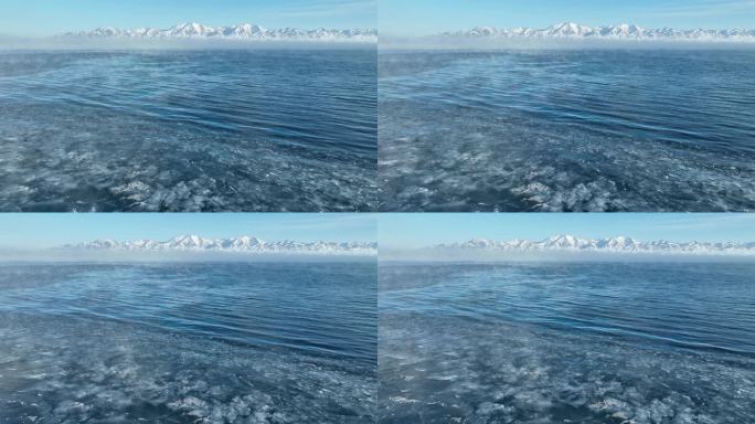 冬季赛里木湖冰推云雾雪山航拍