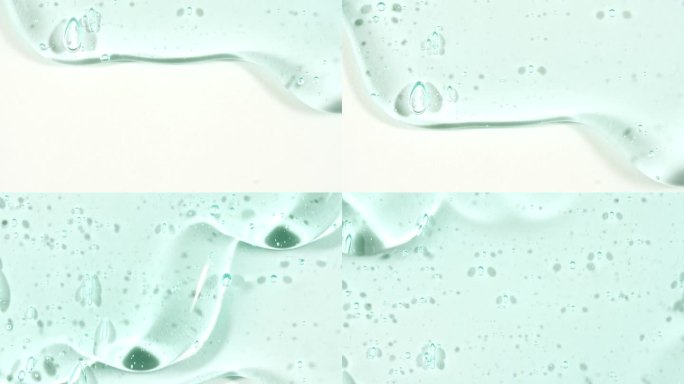 蓝色透明化妆品凝胶流体与分子气泡流动在白色的表面。微距镜头。液体乳霜凝胶透明化妆品样品纹理与泡沫。