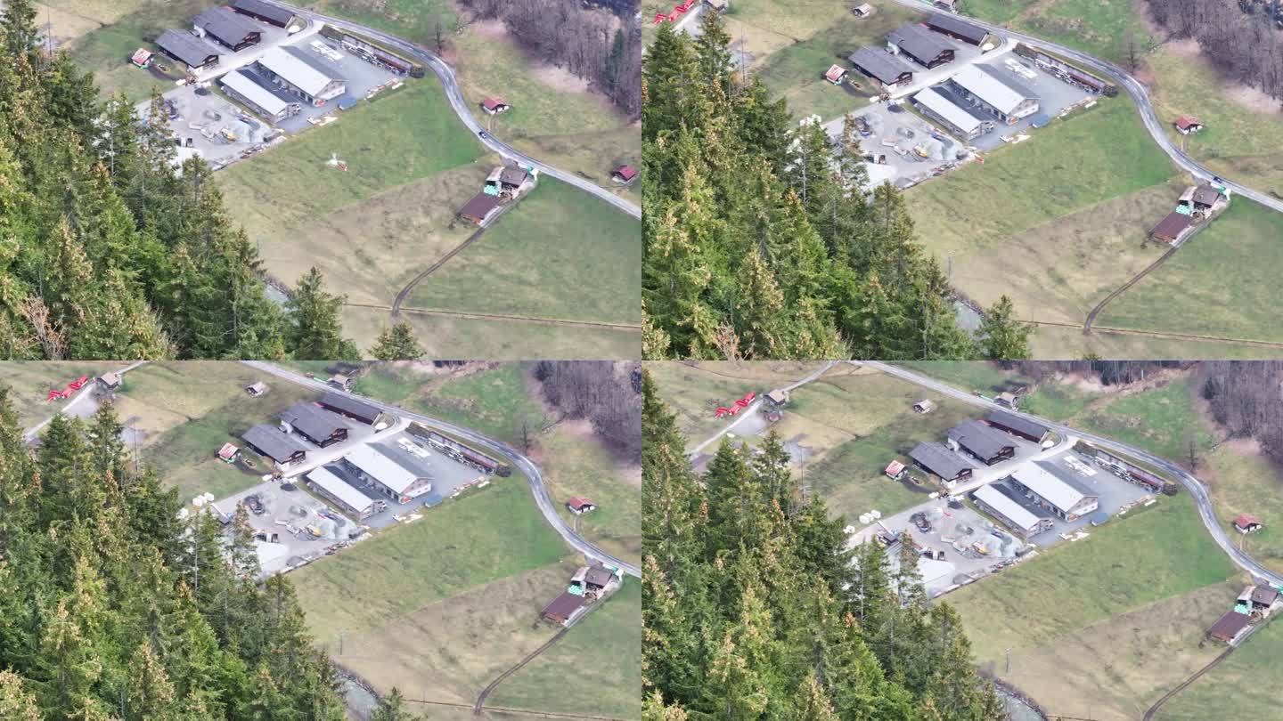 救援直升机飞向瑞士山谷直升机停机坪降落区