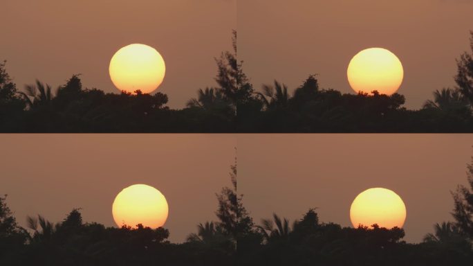 太阳缓慢落山夕阳长焦特写