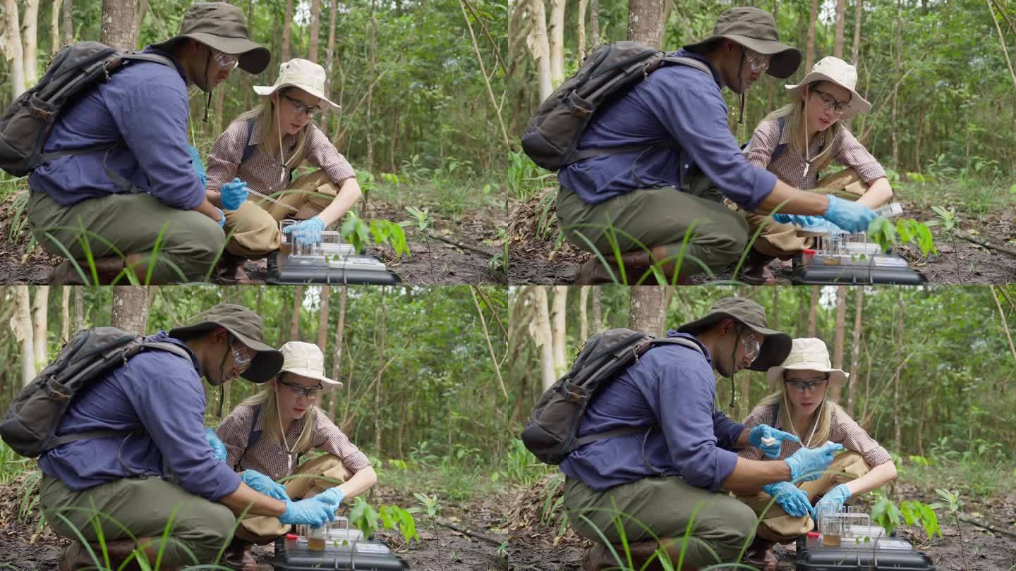 一位年轻的生物学家在泥炭地收集水样，以检查污染物并测量矿物质的丰富程度。