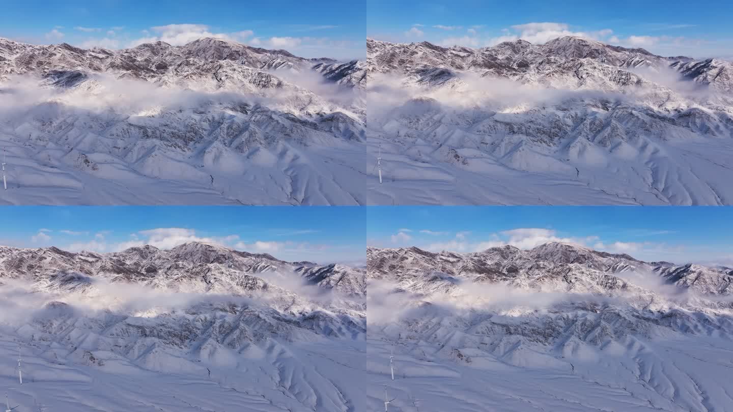 新疆伊犁冬季雪山云雾穿云壮观航拍风景