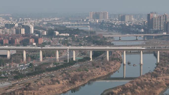 航拍四川广汉城市高铁景色