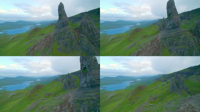 航拍:斯凯岛的湖泊和绿色山谷上风景如画的岩层