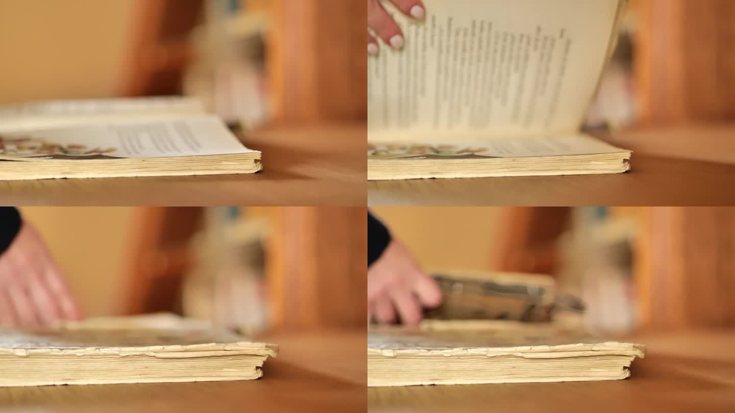 破旧的书。珍贵的书籍。双手翻动书页