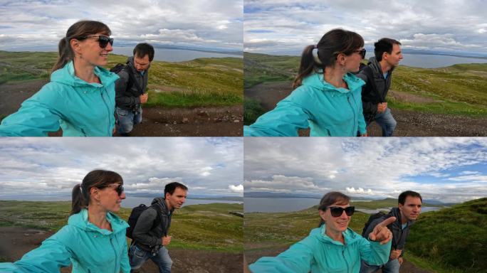 自拍:一对幸福的游客夫妇沿着风景秀丽的小路爬向斯托尔老人