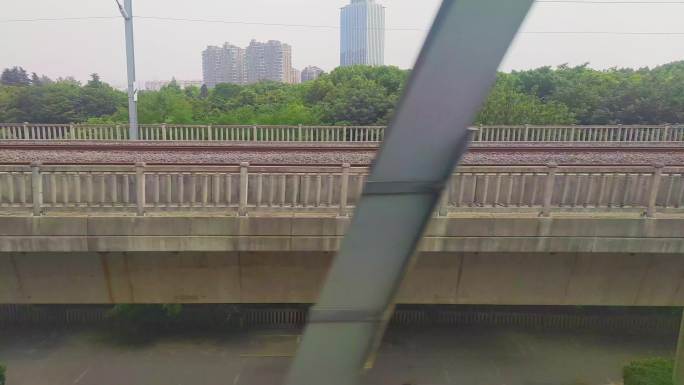 火车动车高铁行驶出站车窗外的风景风光视频