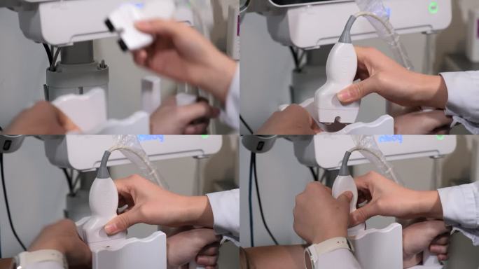 医生用医疗监测仪器对病人手部进行检查