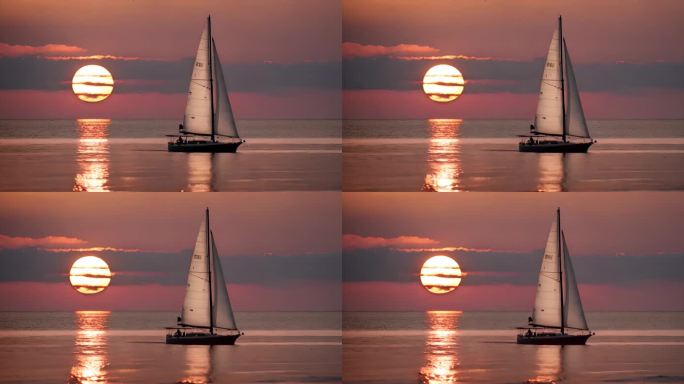海边日落与帆船