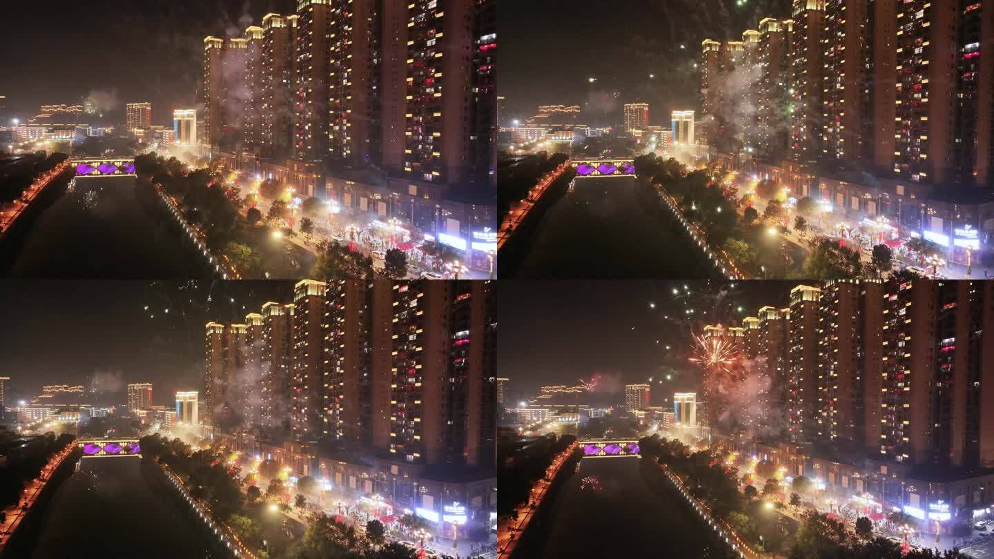 新年烟花火穿越机夜景城市春节唯美跨年