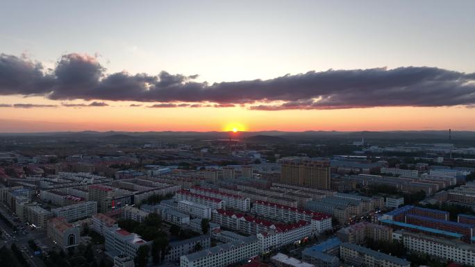 航拍牙克石市区夕阳暮色