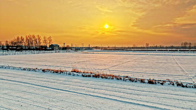 乡村麦田雪景航拍